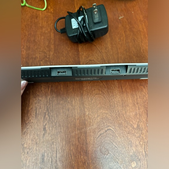 Wireless charger pad with 2 USB ports and power cord. - Picture 3 of 4